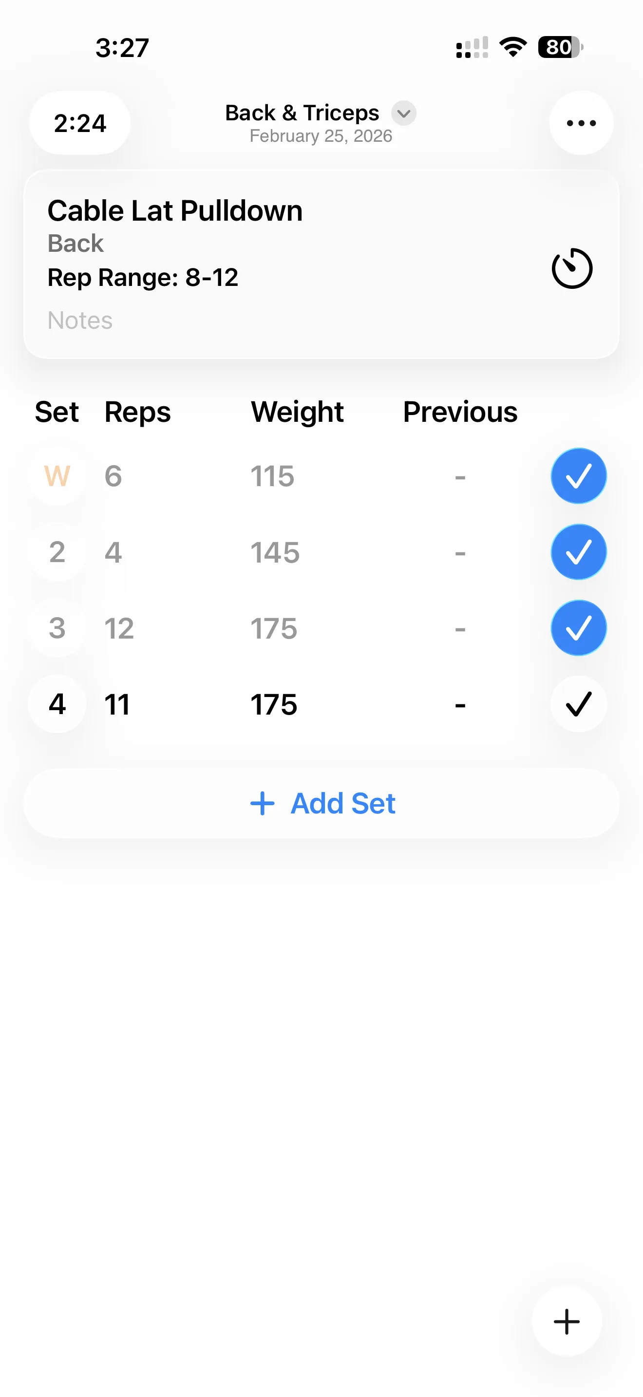 Active workout logging screen with set tracking and exercise progression context